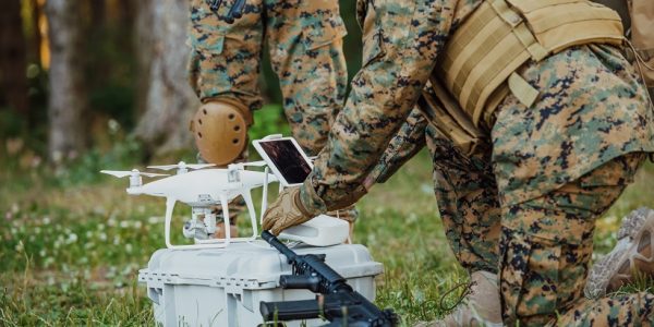 Modern Warfare Soldiers Squad are Using Drone for Scouting and Surveillance During Military Operation in the Forest. (Photo:©Dotshock/Dreamstime.com)