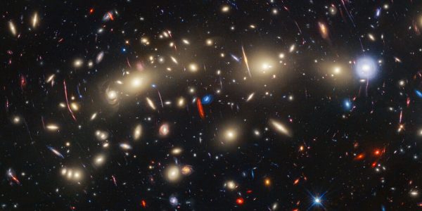 This panchromatic view of galaxy cluster MACS0416 was created by combining infrared observations from the NASA/ESA/CSA James Webb Space Telescope with visible-light data from the NASA/ESA Hubble Space Telescope.  (Photo: NASA, ESA, CSA, STScI)